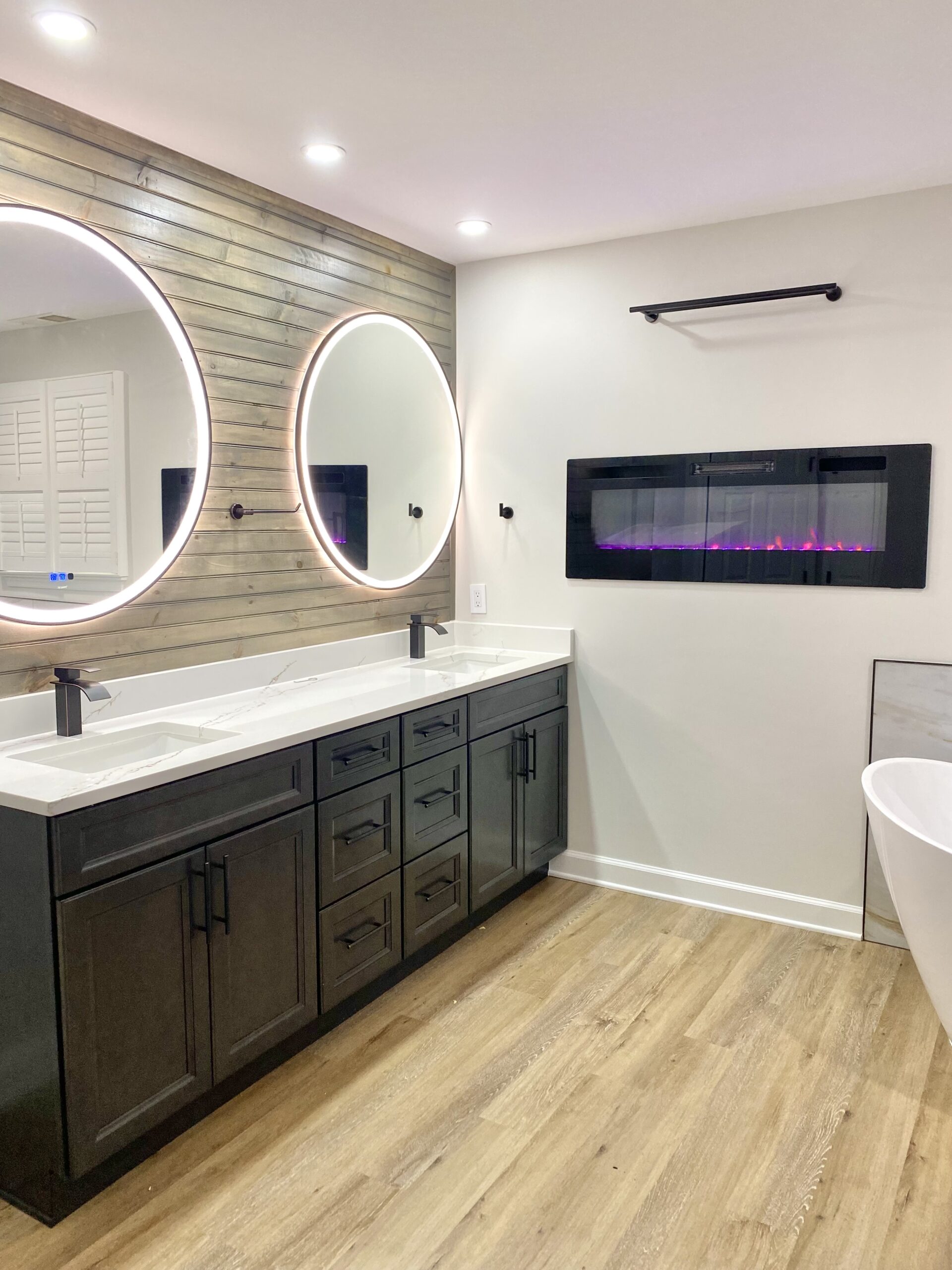 Master bathroom remodel in Brandywine Maryland with custom double vanity and matte black fixtures by MSH Signature Home Improvements