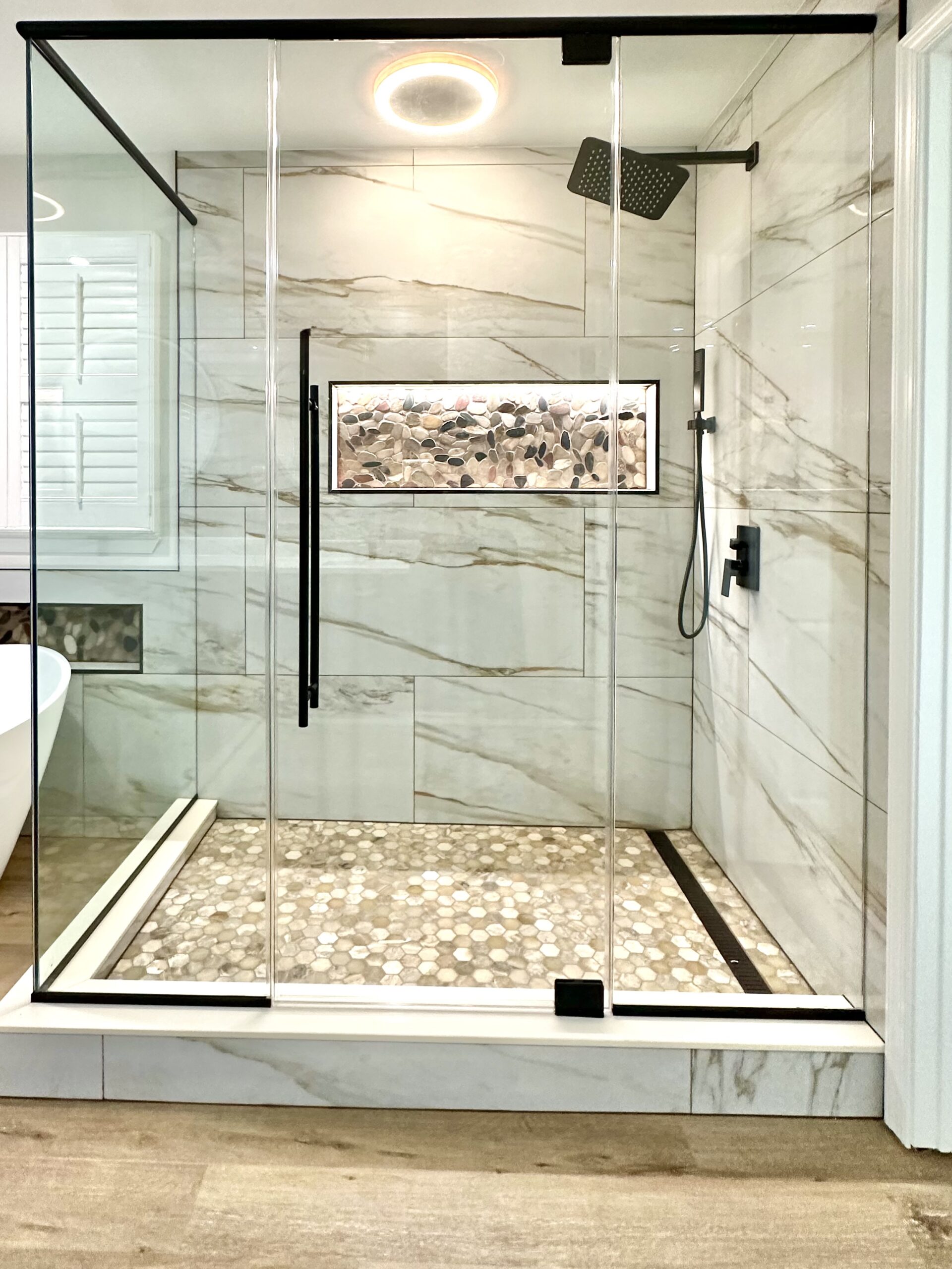 Frameless glass shower enclosure in Upper Marlboro MD by MSH Signature Home Improvements