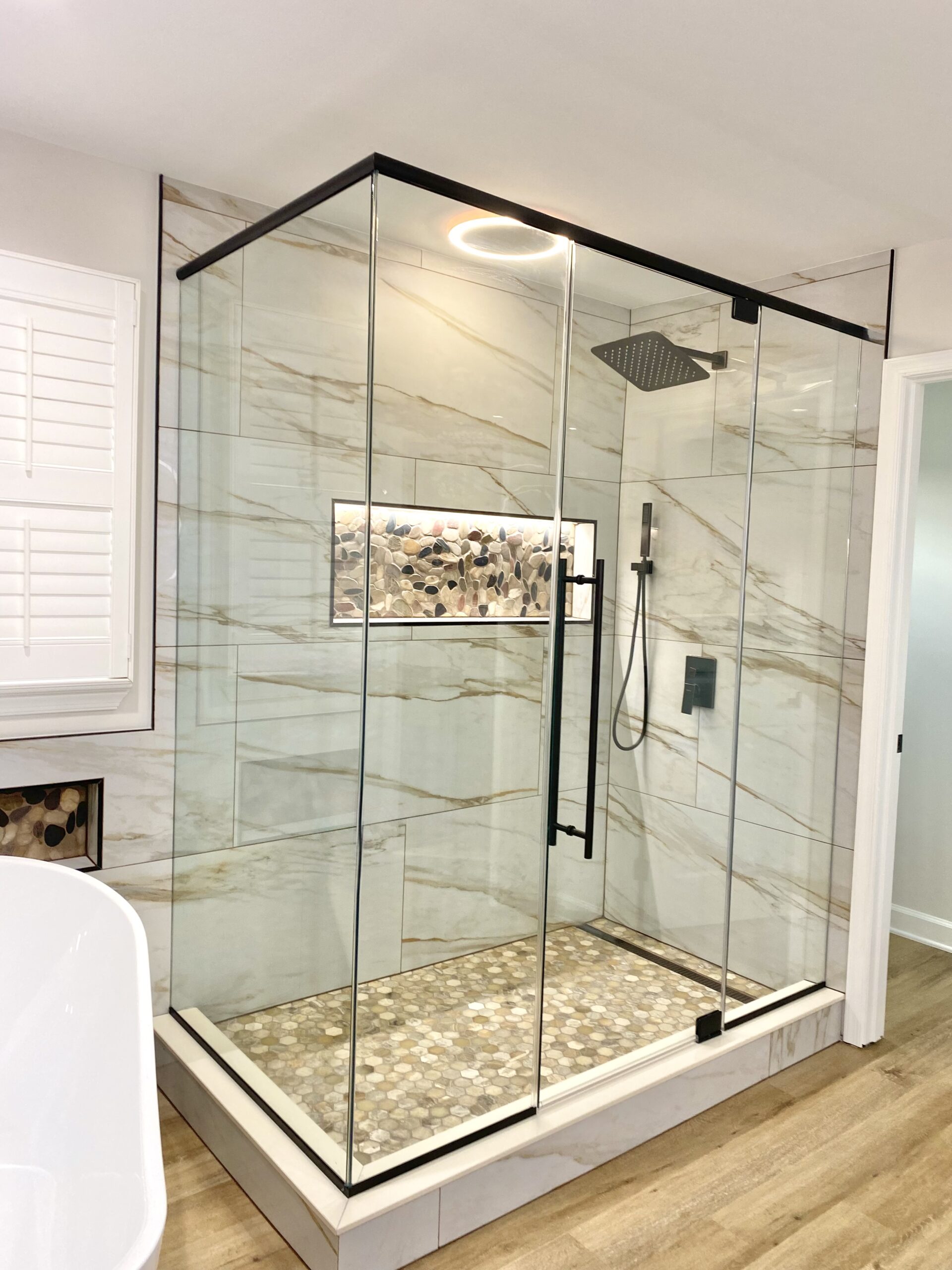 Hinged glass shower door enclosure in Upper Marlboro Maryland